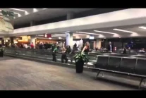 Dancers Perform on Airport Moving Sidewalk